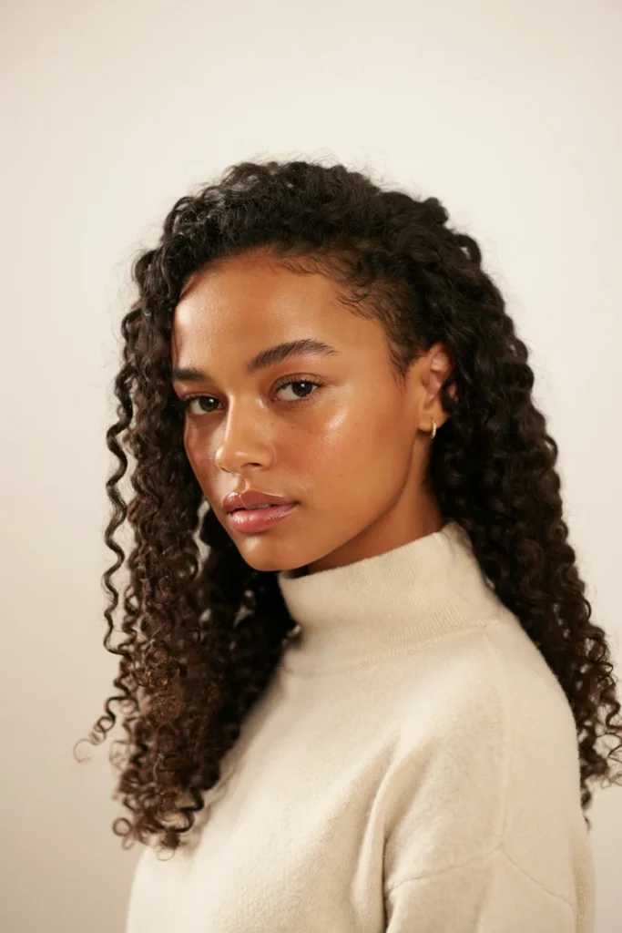 Thick Wavy Locs With a Low Fade