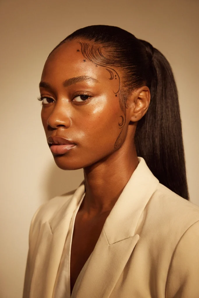 Ponytail with Shaved Sides and Hair Art
